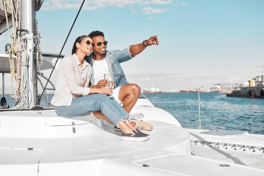 couple-love-yacht-with-man-woman-out-sea-ocean-romance-luxury-date-cruise-happy-trust-care-with-young-male-female-boat-water-together_590464-84886